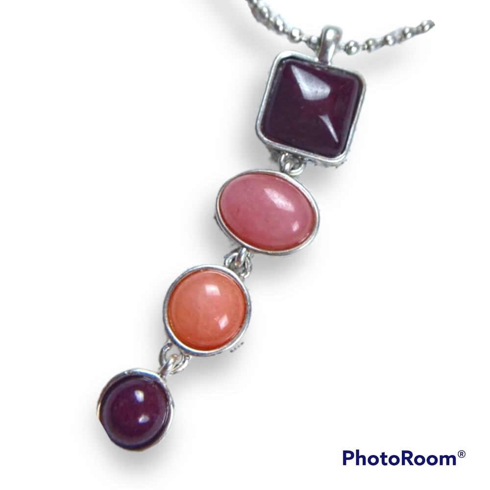 Maroon/pink/coral colored pendant necklace on silver tone chain